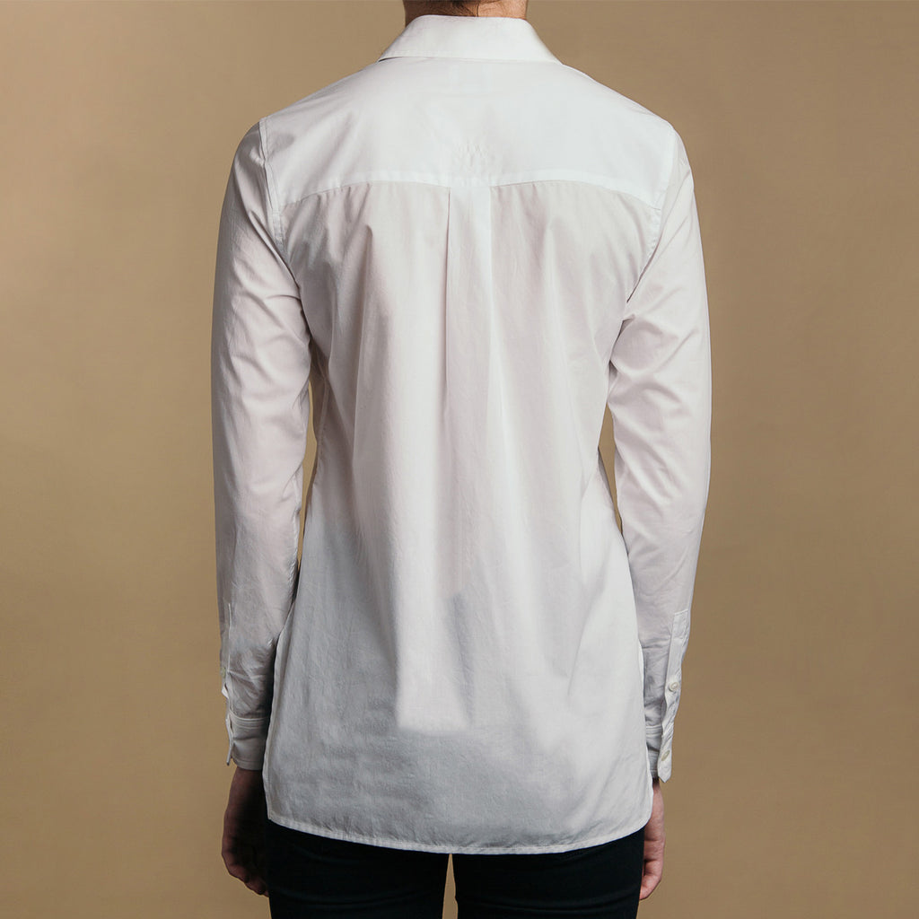 The Trapezoid Shirt - Paper White. Back view. Box pleat, straight hem.