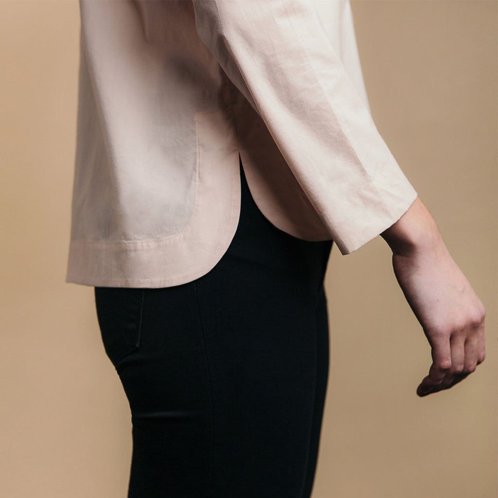 The Equilibrium Shirt - Dusty Blush, side view. Rounded side seams.