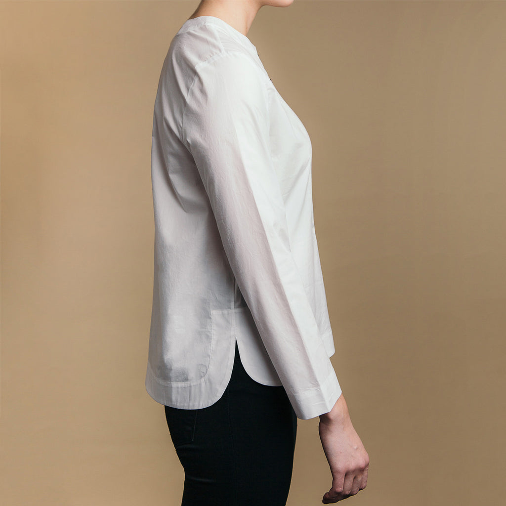 The Equilibrium Shirt - Paper White, side view. Rounded side seams.