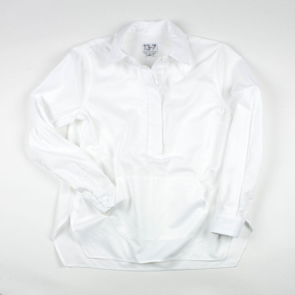 Thirteen Seven white Trapezoid Pullover shirt with front pocket.