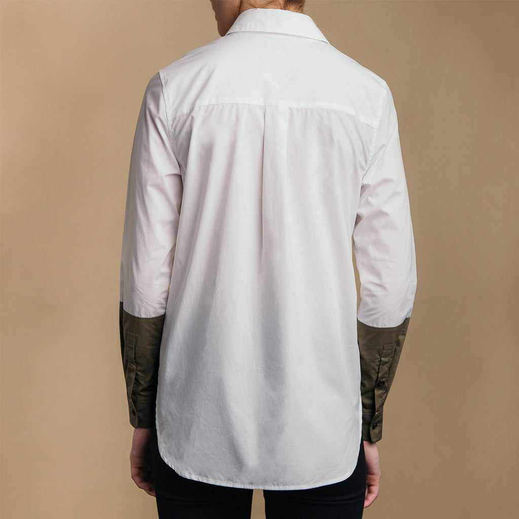 The Hand-Dipped Shirt - Paper White/Matte Olive. Back view. Box pleat, rounded hem.