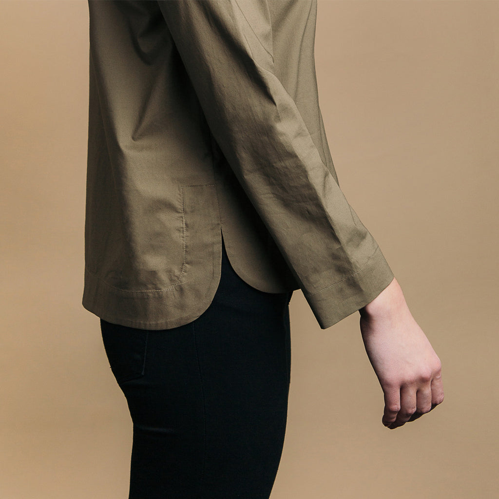 The Equilibrium Shirt - Matte Olive, side view. Rounded side seam hem.