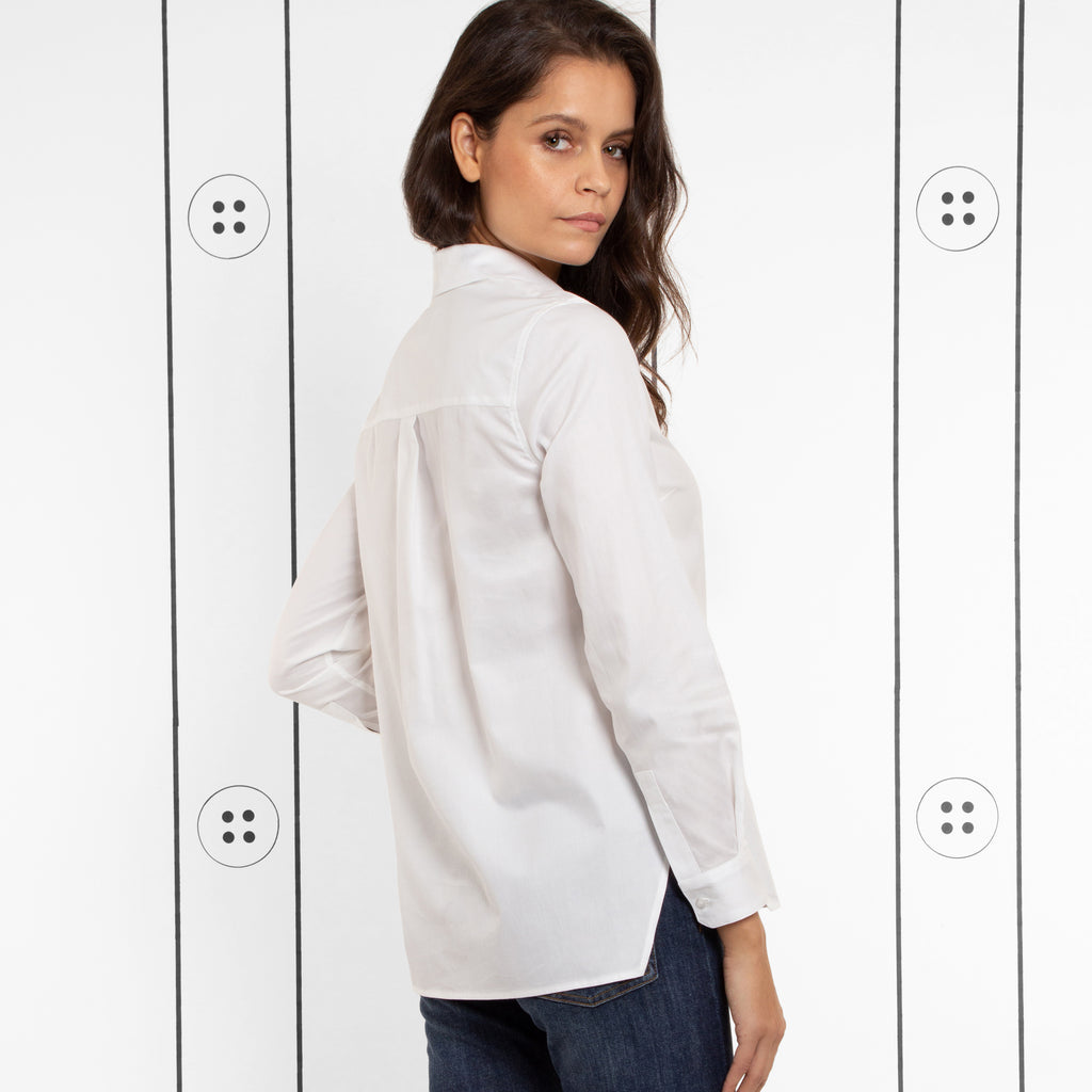 Thirteen Seven white Trapezoid Pullover shirt with front pocket.